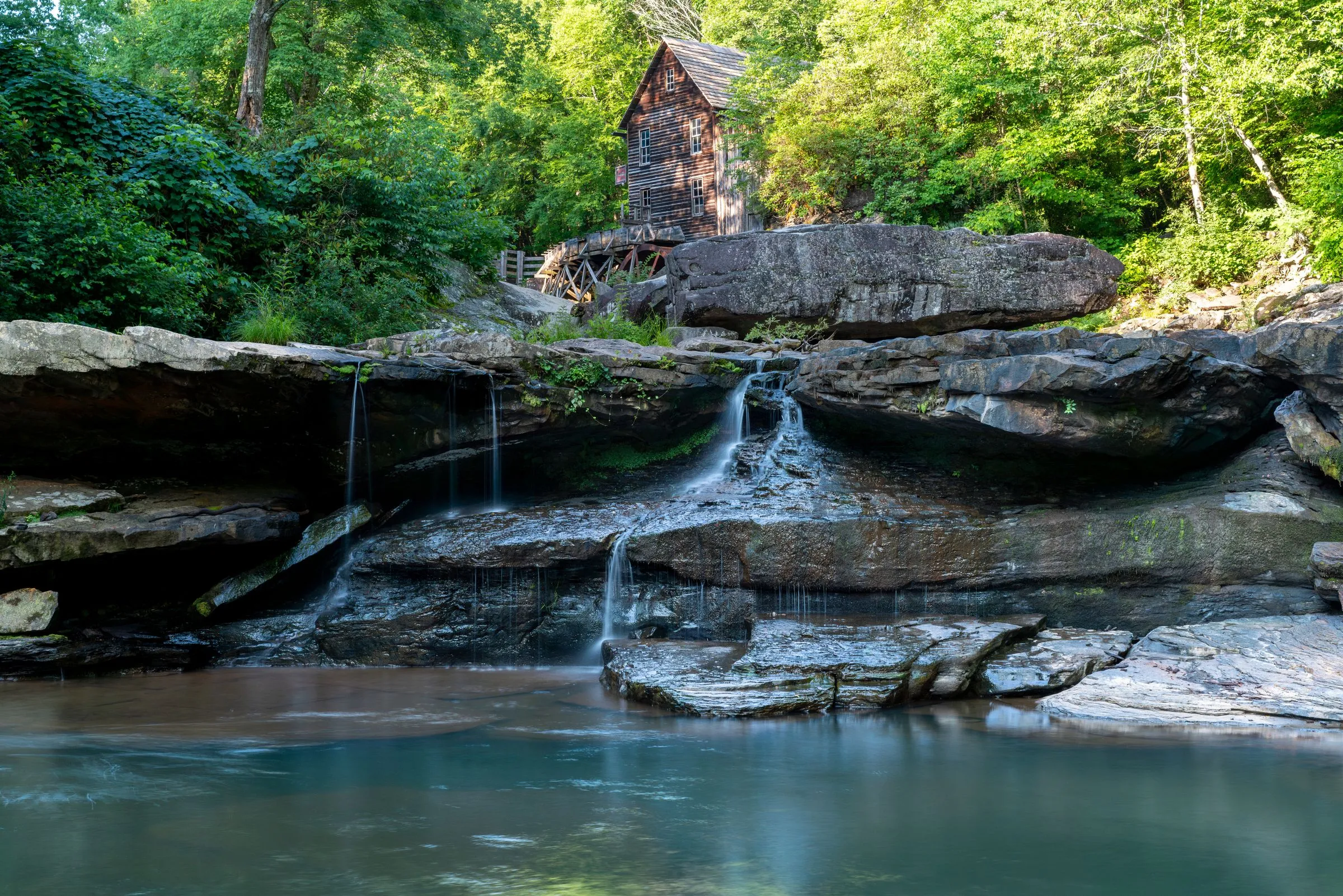 The Glade Creek Grist Mill above a cascade at Babcock State Park